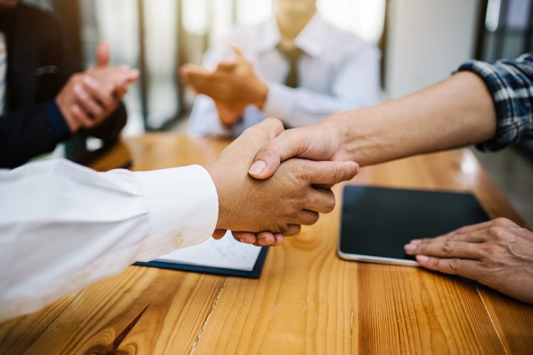 Business man shaking hands to work corporate meeting.